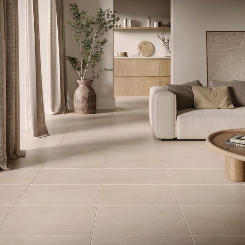 Beige stone effect indoor floor tile